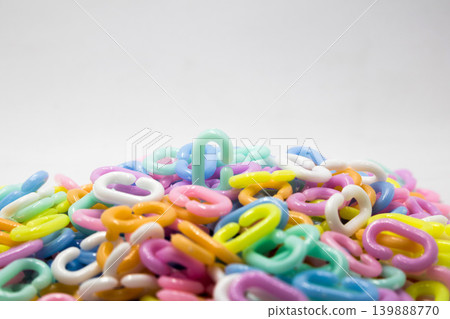 Pastel color of plastic chains on white background.toys concept for recreation Pastel color of plastic chains on white background.toys concept for recreation 139888770