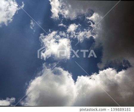 White clouds in a deep blue sky 139889181
