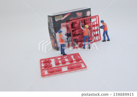 Miniature family scene with seated figures and baby Miniature family scene with seated figures and baby 139889915