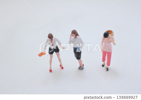 Miniature people performing daily tasks in group Miniature people performing daily tasks in group 139889927