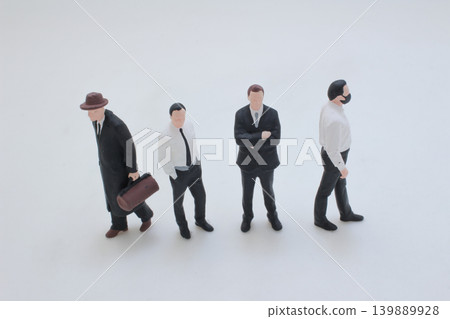 Miniature office worker and casual pedestrian walking Miniature office worker and casual pedestrian walking 139889928