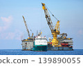 Rig along side the offshore platform for operation. Oil and gas industry in the gulf or the sea for operation. Maintenance and operation service with the construction platform by engineer. 139890055