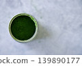 Closeup of can of fresh matcha powder, green tea powder. 139890177