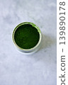 Closeup of can of fresh matcha powder, green tea powder. 139890178