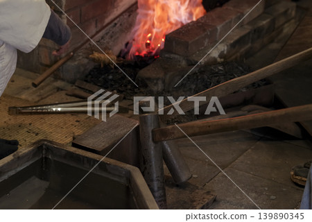 Sparks fly as Japanese swords are forged Sparks fly as Japanese swords are forged 139890345