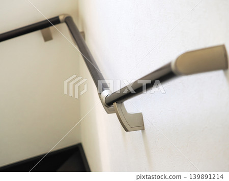 Handrail on the stairs of a detached house 139891214