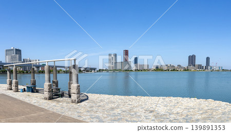 View of Fukuoka Island City from the Kashii Coast Promenade in Higashi Ward, Fukuoka City, Fukuoka Prefecture. View of Fukuoka Island City from the Kashii Coast Promenade in Higashi Ward, Fukuoka City, Fukuoka Prefecture. 139891353