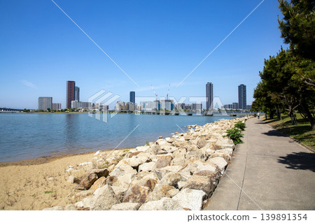 View of Fukuoka Island City from the Kashii Coast Promenade in Higashi Ward, Fukuoka City, Fukuoka Prefecture. View of Fukuoka Island City from the Kashii Coast Promenade in Higashi Ward, Fukuoka City, Fukuoka Prefecture. 139891354