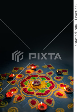 Clay diya lamps lit during diwali celebration, Diwali, or Deepavali, is India's biggest and most important holiday. Clay diya lamps lit during diwali celebration, Diwali, or Deepavali, is India's biggest and most important holiday. 139891459