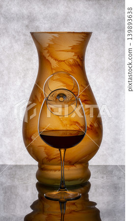 Still life with glass objects on a gray background Still life with glass objects on a gray background 139893638