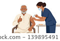 Elderly Indian Man Giving Thumbs Up During Booster Shot 139895491