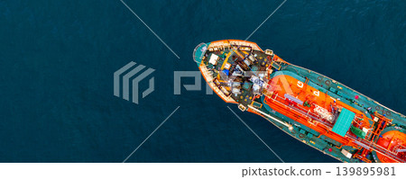 Aerial view Gas ship tanker vessel loading and unloading in oil terminal station refinery, Global business import export logistic transport sea freight cargo gas tanker ship, Red gas tanker ship at 139895981