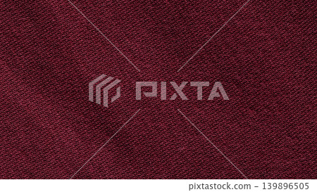 Dark crimson red knitted cotton fabric texture with fine diagonal weave pattern Dark crimson red knitted cotton fabric texture with fine diagonal weave pattern 139896505