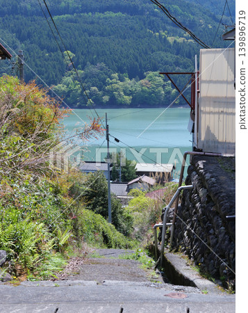 Igawa Dam, Igawa Lake, Oi River, sunny day in April, view from the mountains Igawa Dam, Igawa Lake, Oi River, sunny day in April, view from the mountains 139896719