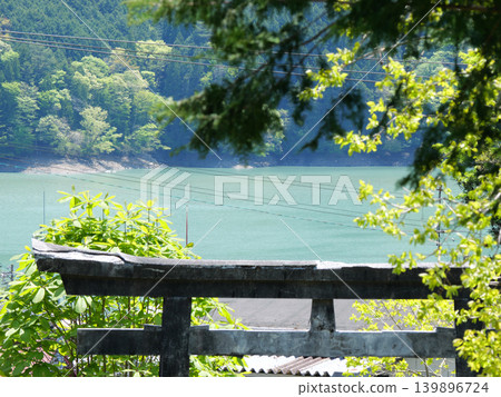 A view from Ikawa Shrine near Ikawa Dam, on a sunny day in April. A view from Ikawa Shrine near Ikawa Dam, on a sunny day in April. 139896724