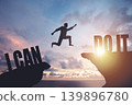 Silhouette of a man jumping from cliff to cliff, business and success concept 139896780