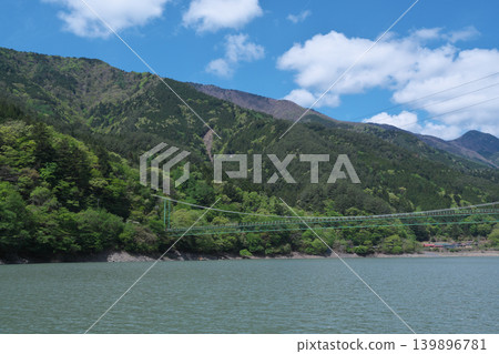 Igawa Dam, Igawa Lake, Oi River, sightseeing boat cruise, sunny day in April 139896781