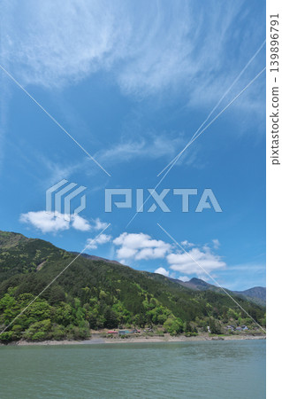 Igawa Dam, Igawa Lake, Oi River, sightseeing boat cruise, contrails, sunny day in April Igawa Dam, Igawa Lake, Oi River, sightseeing boat cruise, contrails, sunny day in April 139896791