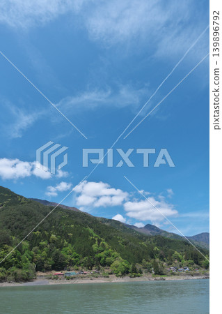 Igawa Dam, Igawa Lake, Oi River, sightseeing boat cruise, contrails, sunny day in April Igawa Dam, Igawa Lake, Oi River, sightseeing boat cruise, contrails, sunny day in April 139896792