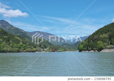 Igawa Dam, Igawa Lake, Oi River, sightseeing boat cruise, sunny day in April Igawa Dam, Igawa Lake, Oi River, sightseeing boat cruise, sunny day in April 139896795
