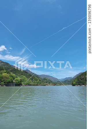 Igawa Dam, Igawa Lake, Oi River, sightseeing boat cruise, sunny day in April Igawa Dam, Igawa Lake, Oi River, sightseeing boat cruise, sunny day in April 139896796