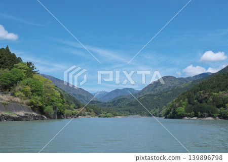 Igawa Dam, Igawa Lake, Oi River, sightseeing boat cruise, sunny day in April Igawa Dam, Igawa Lake, Oi River, sightseeing boat cruise, sunny day in April 139896798