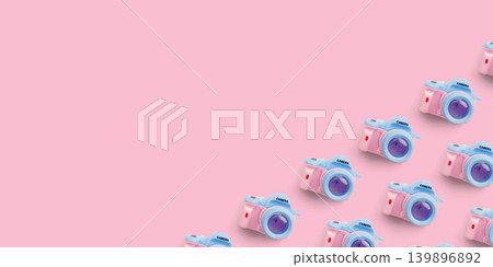 Pattern with SLR camera on pastel color background Pattern with SLR camera on pastel color background 139896892