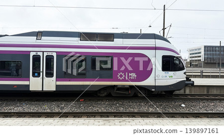 HELSINKI, FINLAND APRIL 14, 2026: HSL commuter train at railway station in Helsinki, Finland HELSINKI, FINLAND APRIL 14, 2026: HSL commuter train at railway station in Helsinki, Finland 139897161