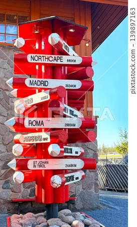 ROVANIEMI, FINLAND APRIL 12, 2026: Direction signpost at Santa Claus Village in Rovaniemi, Lapland, Finland ROVANIEMI, FINLAND APRIL 12, 2026: Direction signpost at Santa Claus Village in Rovaniemi, Lapland, Finland 139897163
