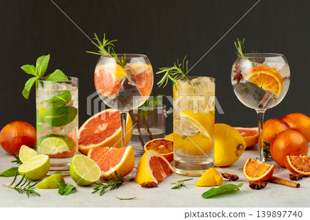 Refreshing summer drinks with ingredients on a white marble table. Refreshing summer drinks with ingredients on a white marble table. 139897740
