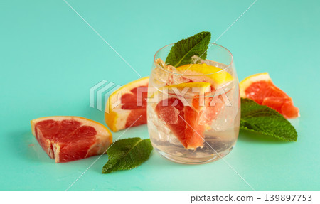 Summer refreshing drink with ice and grapefruit. Summer refreshing drink with ice and grapefruit. 139897753