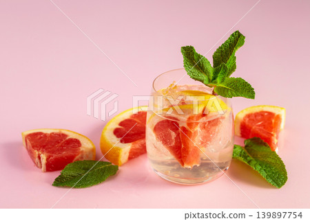 Summer refreshing drink with ice and grapefruit. Summer refreshing drink with ice and grapefruit. 139897754