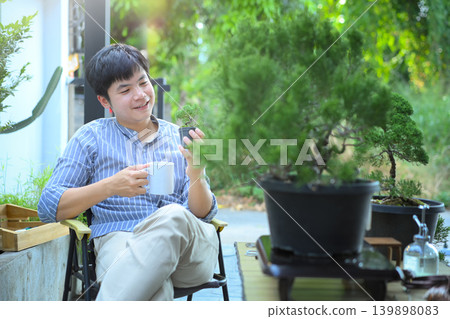 Relaxing with bonsai and coffee in a peaceful garden moment Relaxing with bonsai and coffee in a peaceful garden moment 139898083