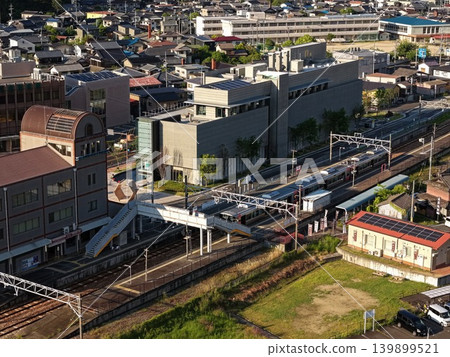 An aerial photograph showing the urban area around Ibe Station in Bizen City, Okayama Prefecture, viewed from an oblique angle. An aerial photograph showing the urban area around Ibe Station in Bizen City, Okayama Prefecture, viewed from an oblique angle. 139899521