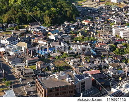 An aerial photograph overlooking the residential area around Ibe Station in Bizen City, Okayama Prefecture. An aerial photograph overlooking the residential area around Ibe Station in Bizen City, Okayama Prefecture. 139899530