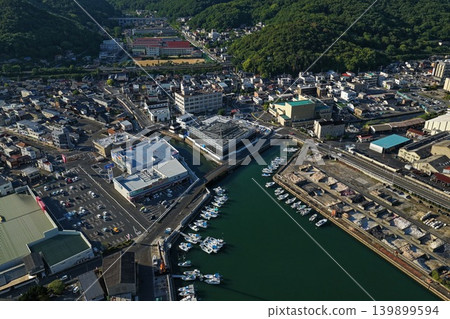 Aerial photograph capturing the fishing port and town area along Katakami Bay in Bizen City, Okayama Prefecture. Aerial photograph capturing the fishing port and town area along Katakami Bay in Bizen City, Okayama Prefecture. 139899594