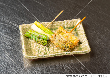Asparagus kushikatsu: Delicious crispy vegetable skewers. Asparagus kushikatsu: Delicious crispy vegetable skewers. 139899982