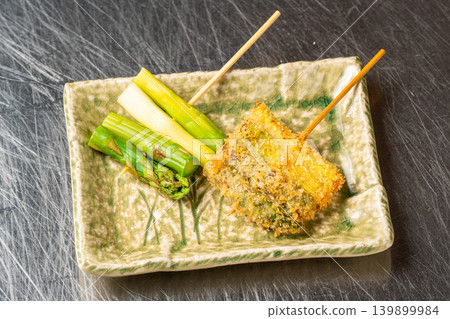 Asparagus kushikatsu: Delicious crispy vegetable skewers. Asparagus kushikatsu: Delicious crispy vegetable skewers. 139899984