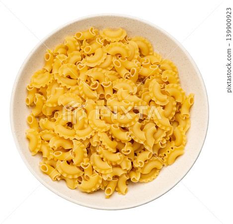 Dried macaroni cockerel scallops. Pasta in a ceramic bowl isolated on a white background. Dried macaroni cockerel scallops. Pasta in a ceramic bowl isolated on a white background. 139900923