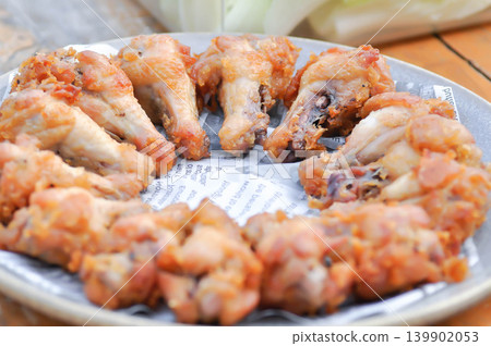 fried chick with fried garlic or chicken wings or deep fried chicken , fried chicken fried chick with fried garlic or chicken wings or deep fried chicken , fried chicken 139902053