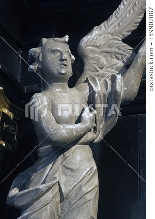 Angel statue in the chapel of Our Lady of the Kamenita vrata (Stone Gate) in Zagreb, Croatia Angel statue in the chapel of Our Lady of the Kamenita vrata (Stone Gate) in Zagreb, Croatia 139902087