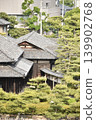 An old mansion and a pine garden 139902768