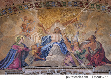 Christ in glory, bezel greater arch, the facade of the Basilica Saint Mark, Venice, Italy Christ in glory, bezel greater arch, the facade of the Basilica Saint Mark, Venice, Italy 139903236