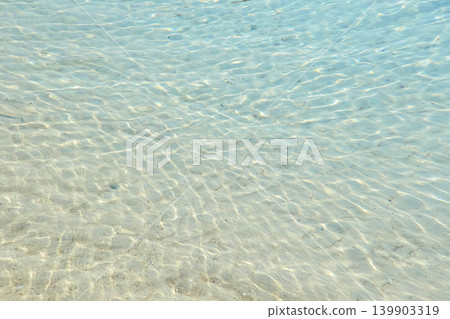 Beautiful beach scenery of Ishigaki Island, Okinawa, with its crystal-clear waters and pristine white sand. Beautiful beach scenery of Ishigaki Island, Okinawa, with its crystal-clear waters and pristine white sand. 139903319
