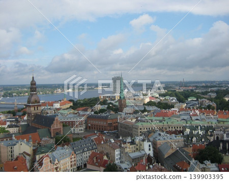 A view overlooking the historic district of Riga, which retains its medieval atmosphere. A view overlooking the historic district of Riga, which retains its medieval atmosphere. 139903395