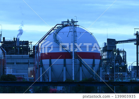 A factory plant with a spherical gas tank: A landscape of industrial infrastructure. A factory plant with a spherical gas tank: A landscape of industrial infrastructure. 139903935
