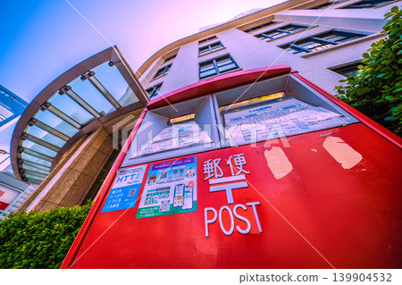 A view of Tokyo's cityscape, including Tokyo Station, Tokyo Central Post Office, and the mailbox at KITTE. A view of Tokyo's cityscape, including Tokyo Station, Tokyo Central Post Office, and the mailbox at KITTE. 139904532
