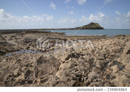 Weryn island tidal causeway connecting rocky coastal landscape Weryn island tidal causeway connecting rocky coastal landscape 139904864
