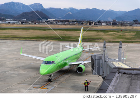 Airplane heading to the runway 139905297