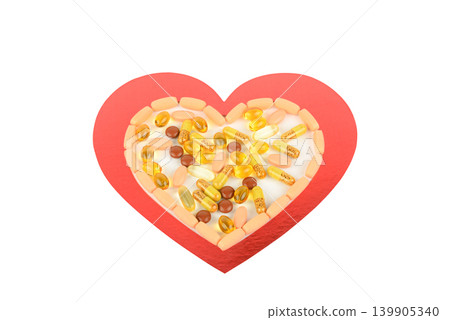 Cardiovascular health concept with pharmaceutical tablets and gel caps. Cardiovascular health concept with pharmaceutical tablets and gel caps. 139905340